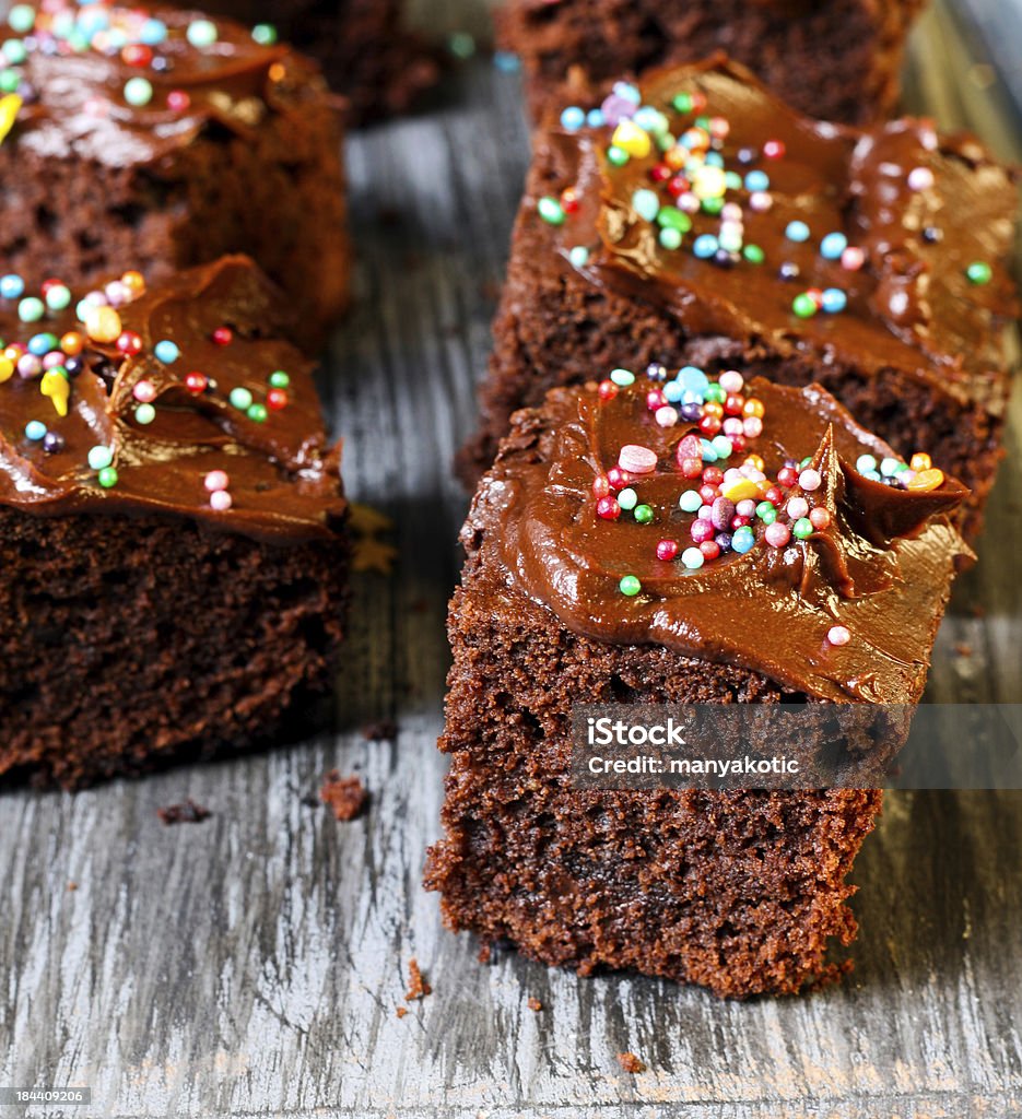 Mega brownies Mega brownies with chocolate cream and sprinkles Cake Stock Photo