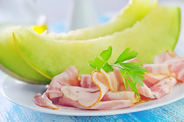 melon with ham on plate