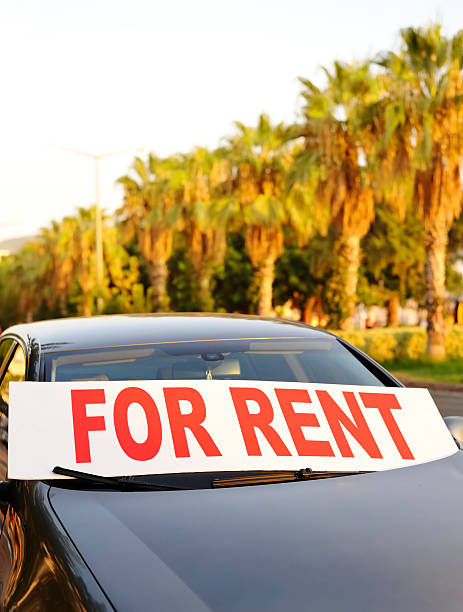 istock car for rent in the street 184411024