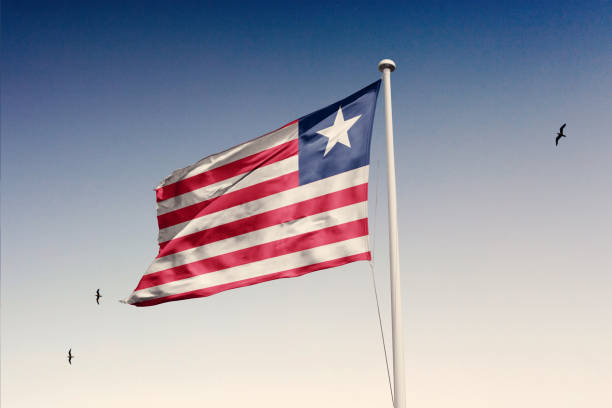 Liberia flag fluttering in the wind on sky.