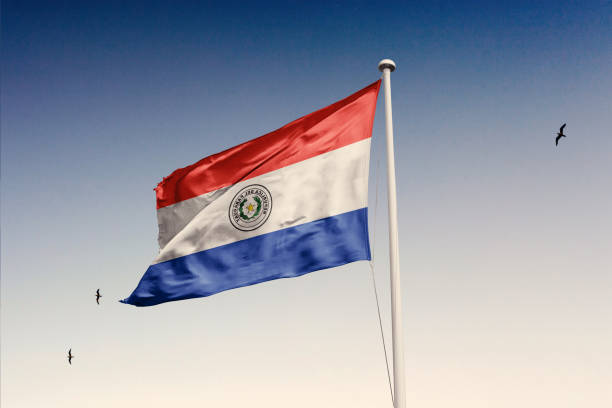 istock Paraguay flag fluttering in the wind on sky. 1844151973