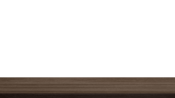 istock empty dark brown walnut wooden table counter top in foreground isolated on background with clipping path. counter bar foreground can be used for display or montage products. 1844162361