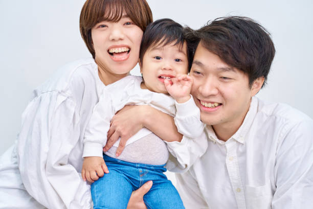 istock Family smiling and lining up 1844171355