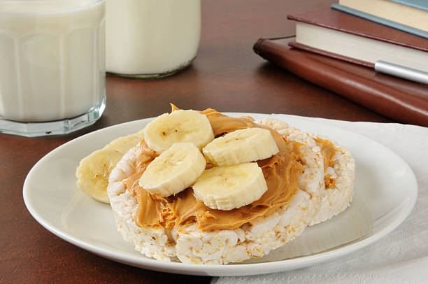 istock Peanut butter and banana on a rice cake 184421330