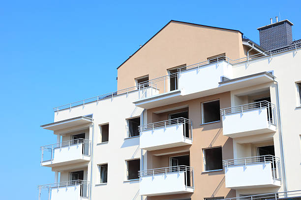 istock Construction site of local homes with rooftops 184421502