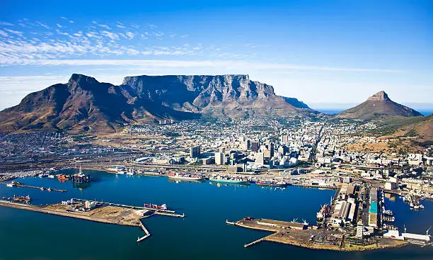 Aerial view of Cape Town city centre, with Table Moutain, Cape Town Harbour, Lion's Head and Devil's Peak