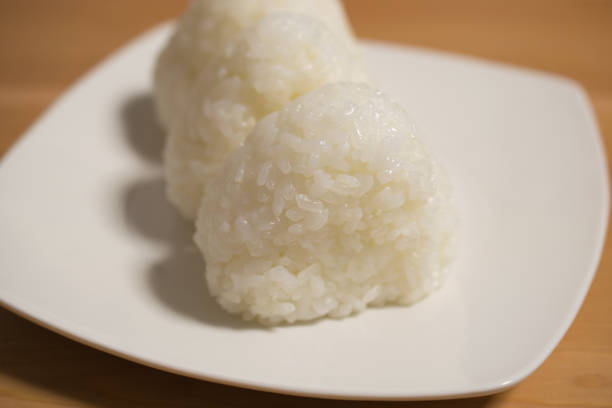 istock Delicious looking salted rice balls on a plate 1844220339