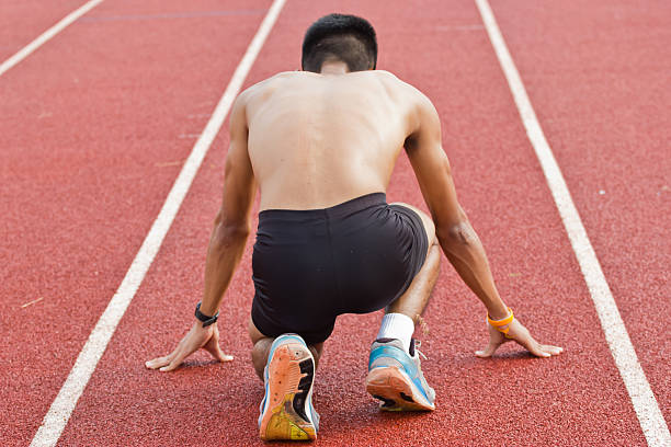 istock Male athlete all set before race starts. 184423274