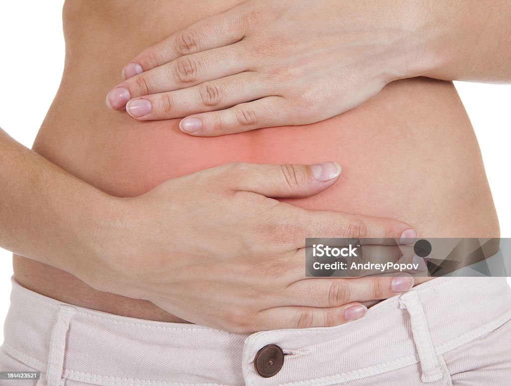 Nahaufnahme der weiblichen Hand am Bauch - Lizenzfrei Anatomie Stock-Foto