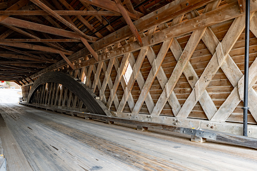 Interior image of historic timber one lane covered bridge in the Town of Newfield, Tompkins County NY.