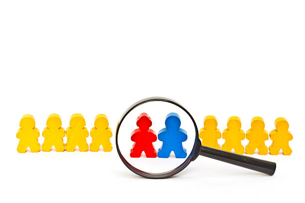 istock Row of wooden doll .. 184424716