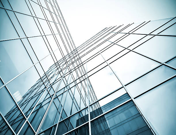 istock underside view to steel glass high rise building 184426121