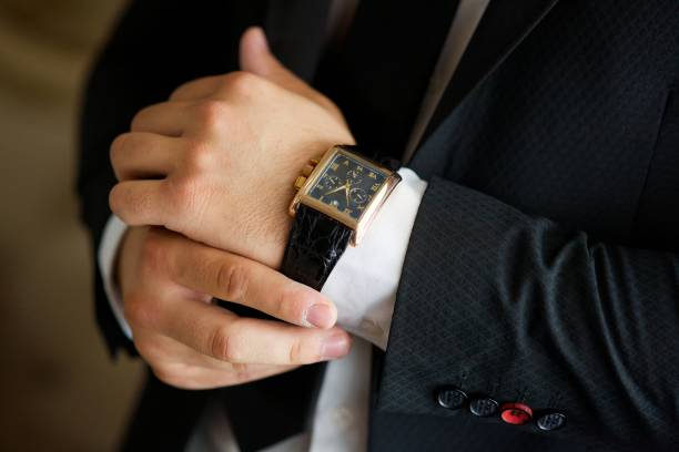 istock Men's hands and expensive watches 1844265327