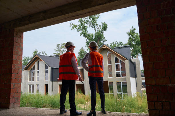 istock Foreman and construction supervisor conducting visual inspection of house 1844269717