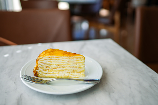 Mille Crepe on a table at a cafe