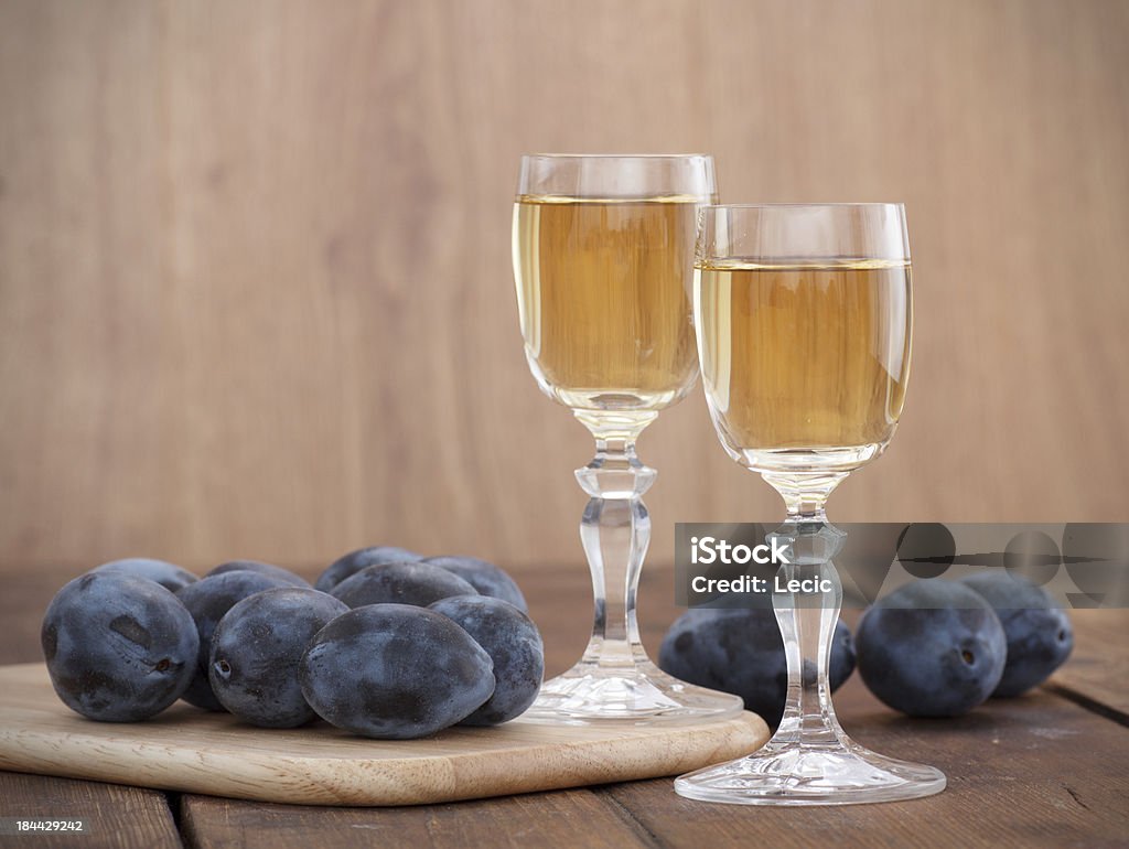 brandy or schnapps with fresh and tasty plum Plum brandy or schnapps with fresh and tasty plum Agriculture Stock Photo