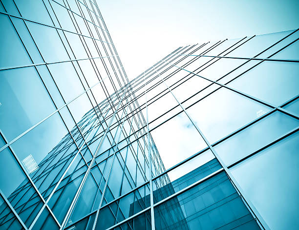 istock underside view to steel glass high rise building 184429827