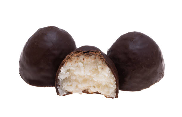 chocolate candy with coconut flakes isolated on white background