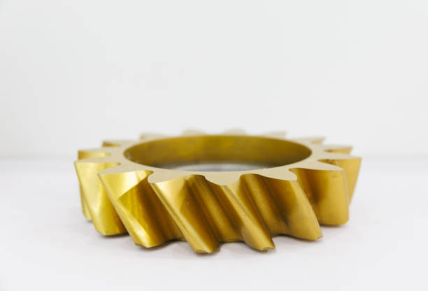 Golden gear on white background