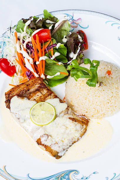 istock tuna steak and fried rice with butter 184439482