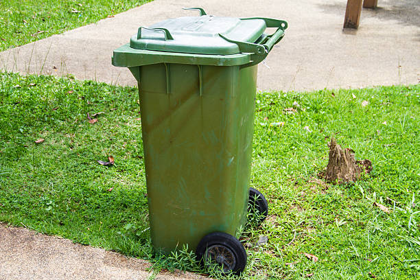 istock Green trash can in the park 184443006