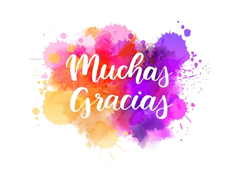 Muchas gracias - Thank you very much in Spanish. Handwritten modern calligraphy lettering text on abstract watercolor paint splash background.