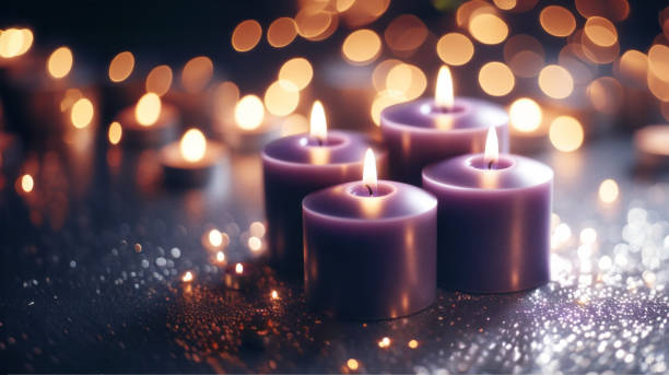 Purple candles with background bokeh