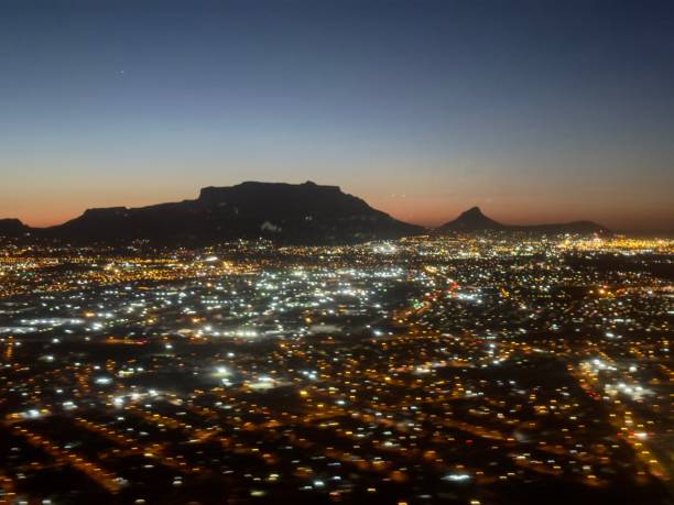 istock Blurry lights and Table Mountain from a plane busy landing 1844466508