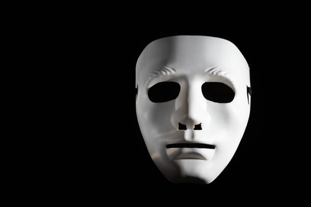 istock White mask, cabaret elegance, dramatic celebration, vintage costume on black background 1844467629