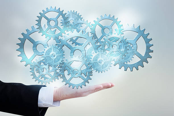 istock Businessman hand draws gear to success concept 184448703
