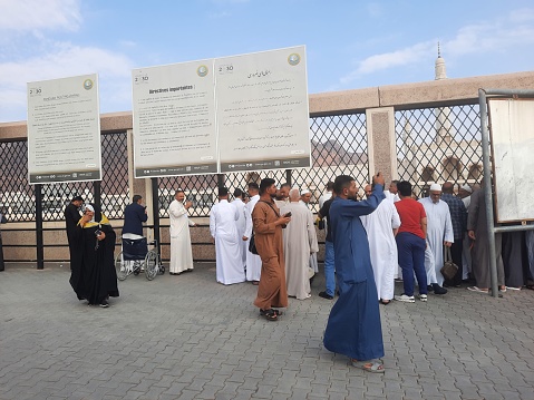 Pilgrims from all over the world are seen in front of the place of martyrs of Uhud in Madinah, Saudi Arabia.