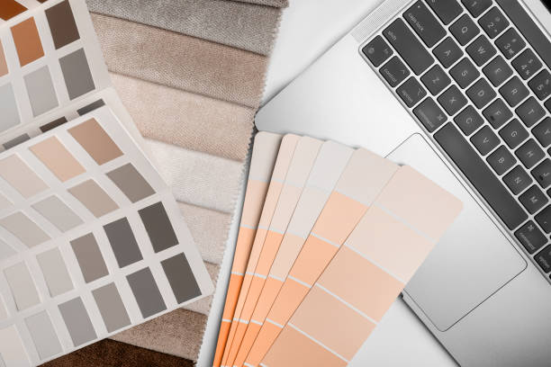 istock different types of fabrics with a color palette and laptop 1844520735
