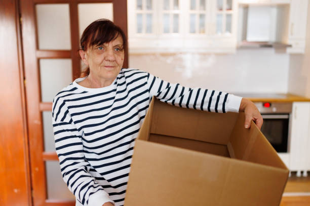 istock Senior woman moving into a new apartment 1844525133