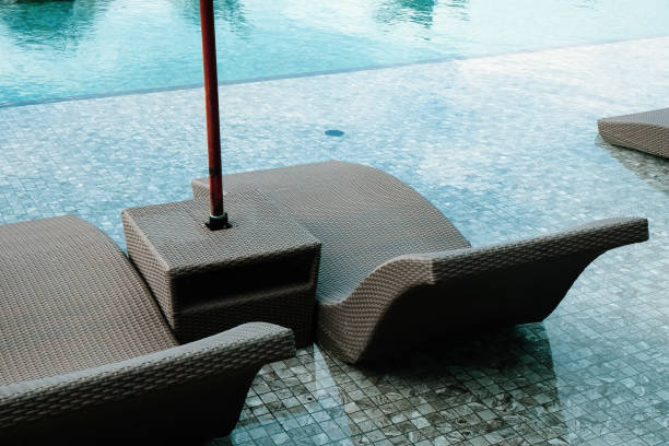 istock Image of Chaise longue at the pool in tropical resort 1844529984
