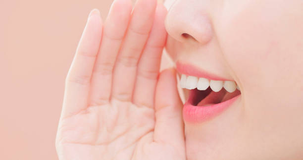 istock Asian beauty whispers happy smile 1844583555