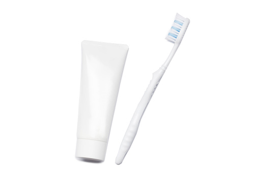 Toothbrushes, toothpaste,  on white background. Dental care