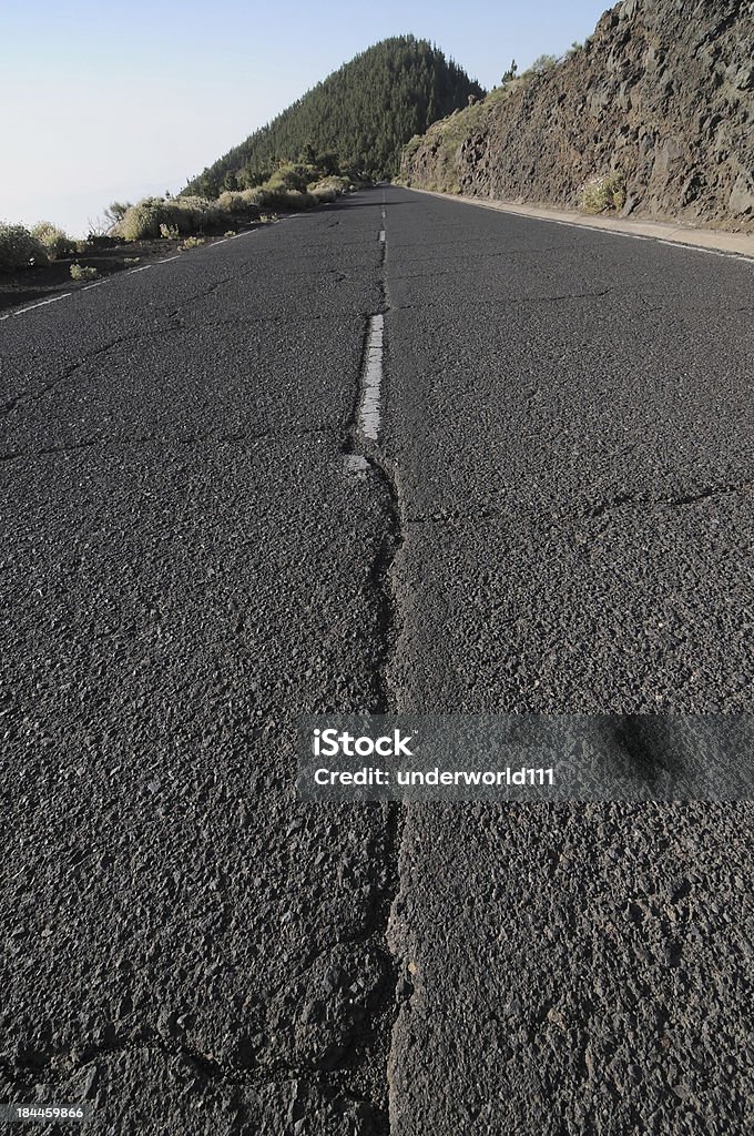 Lonely Road One Lonely Road in the Desert in Tenerife, Spain Arid Climate Stock Photo