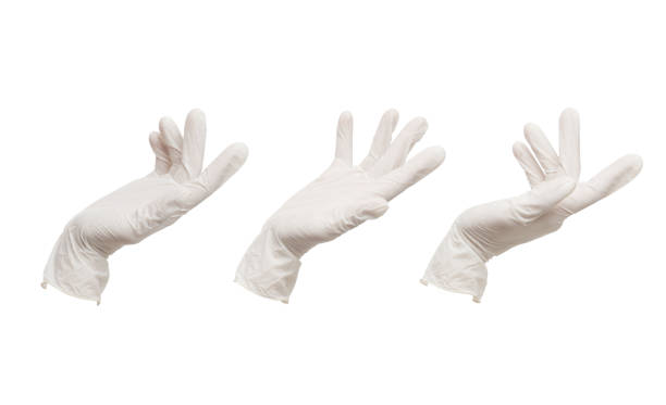 istock white medical gloves isolated on white background. Gestures. 1844614015