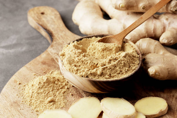 istock Dry and fresh ginger close-up on a textured background. Spice, ingredient. 1844627638