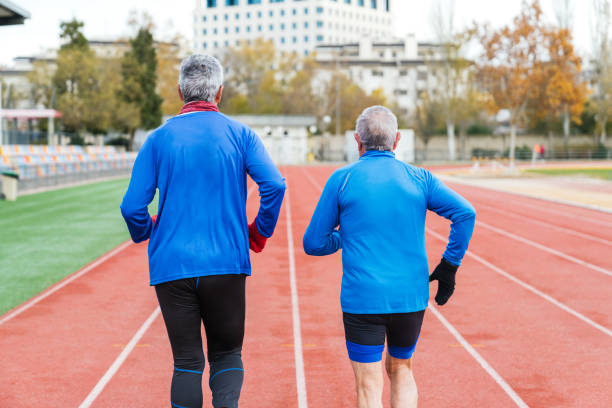 istock Senior Caucasian Men Preparing for Track Run in Athletic Gear 1844633963