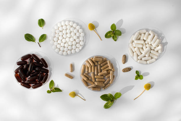 istock Various vitamins, tablets and dietary supplements with natural formulations on a white background. 1844655742
