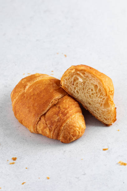 istock Fresh croissants on a grey background. French breakfast. 1844658452