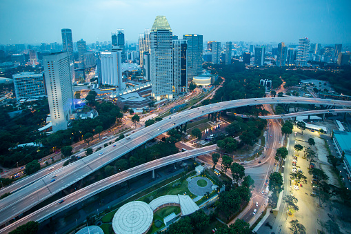 Central Business District, Singapore - July 10, 2015 : View Of Skysrapers And Highway In Downtown Area At Dusk.