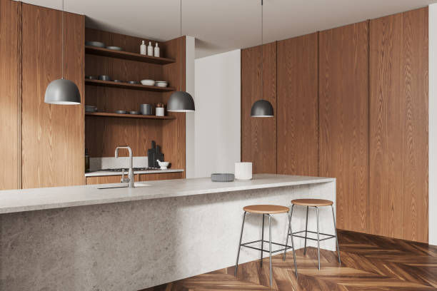 istock Stylish home kitchen interior with bar countertop, cabinet and kitchenware 1844673531