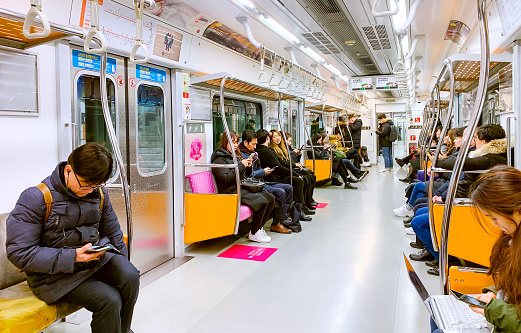 Seoul, South Korea - ‎‎‎January 17, 2019 : People Sitting Inside Of Metro Train Carriage In Seoul, South Korea.