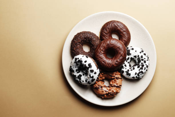 istock Sweet donuts on a colored background. Place for text 1844676667