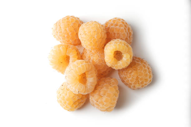 istock Fresh ripe yellow raspberries on a white background. 1844679283