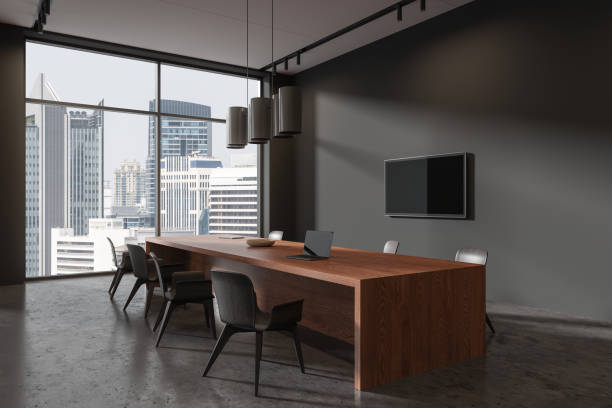 istock Minimalist meeting room interior with table and tv screen, panoramic window 1844680854
