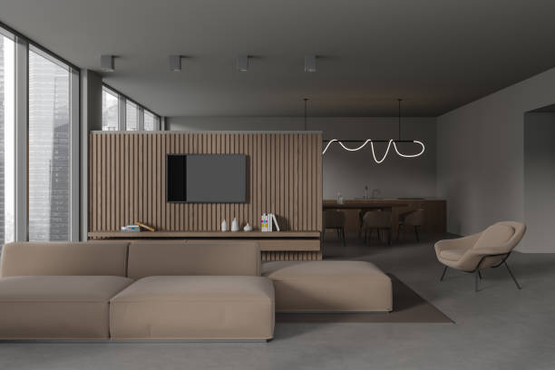 istock Grey flat interior with relax place with tv screen and kitchen eating zone 1844690384