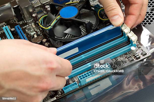 Installing Random Access Memory Into Pc Stock Photo - Download Image Now - CPU, Circuit Board, Close-up